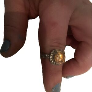 Vintage-Inspired Gold and Clear Halo Ring